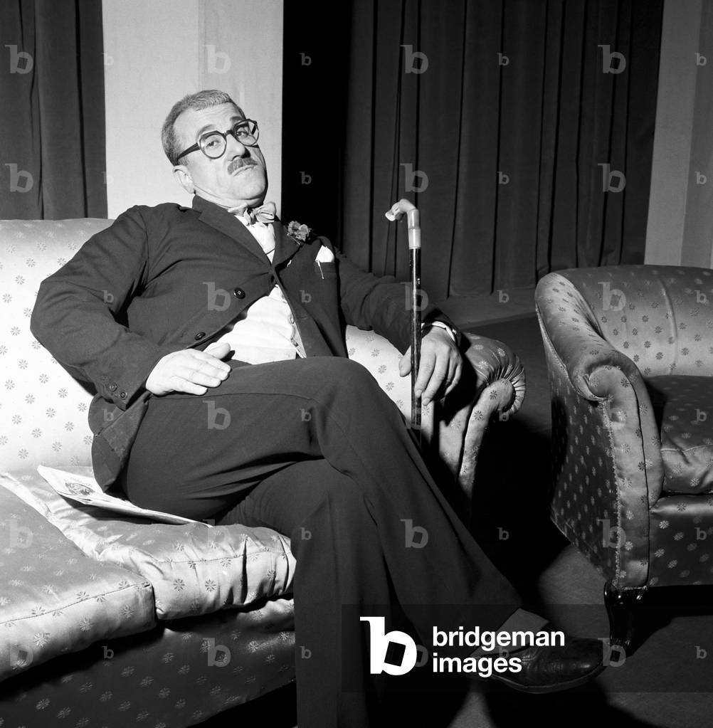 Peppino De Filippo sitting on a sofa, Milan, Italy