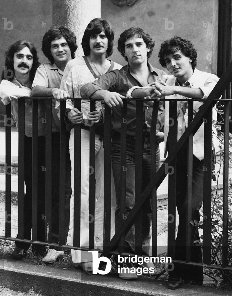 Collage leaning on a railing