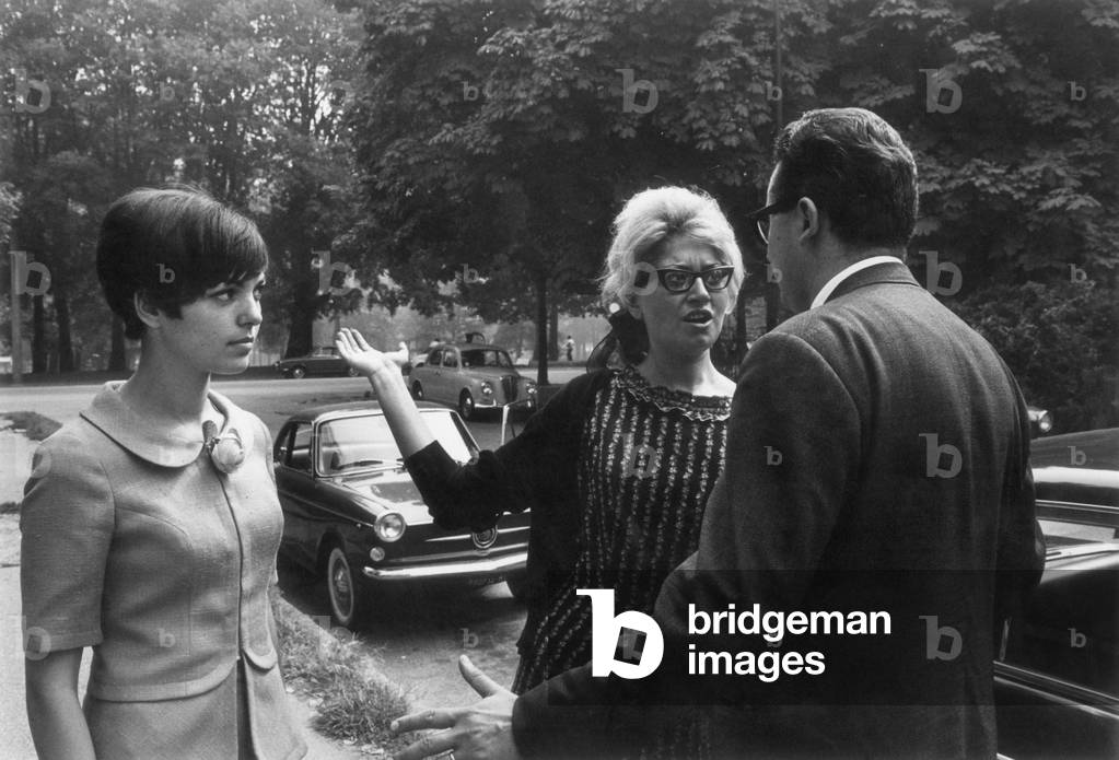 Wife slapping her cheating husband, Italy, 1966 (b/w photo)
