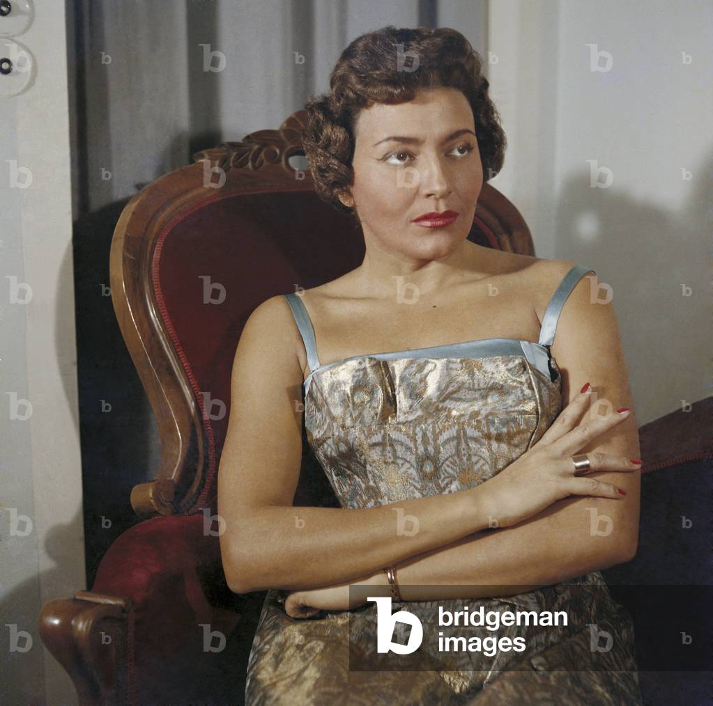 Nilla Pizzi sitting in an armchair