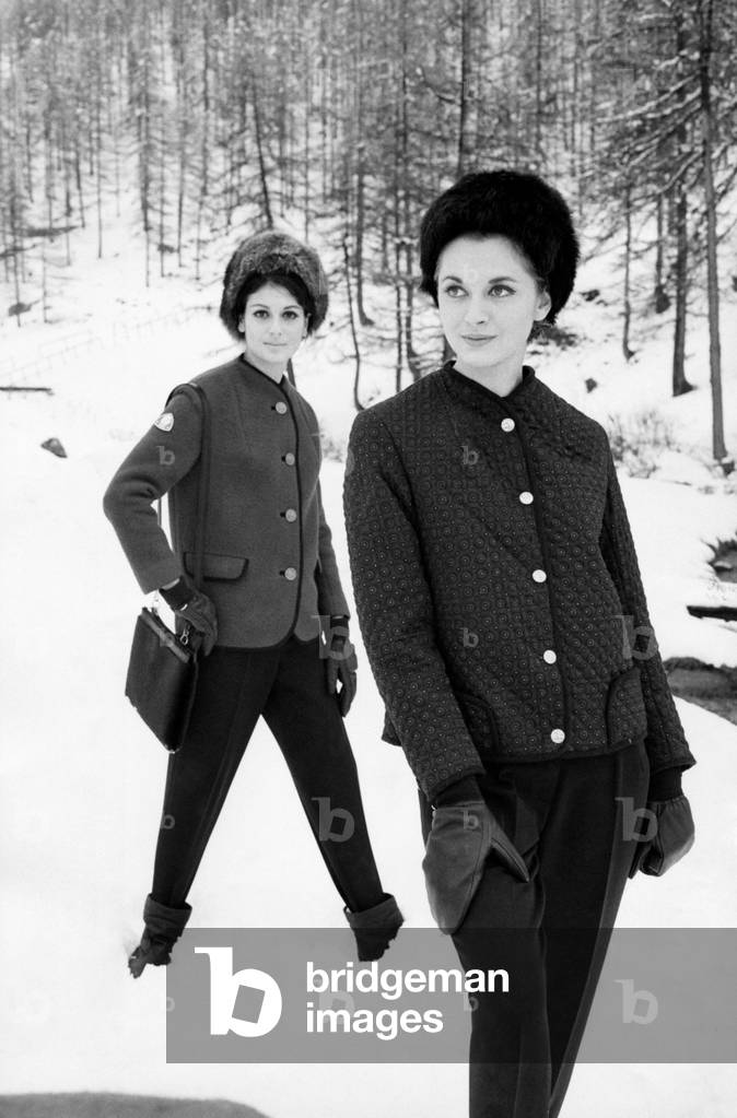 Two models wear elegant winter jackets