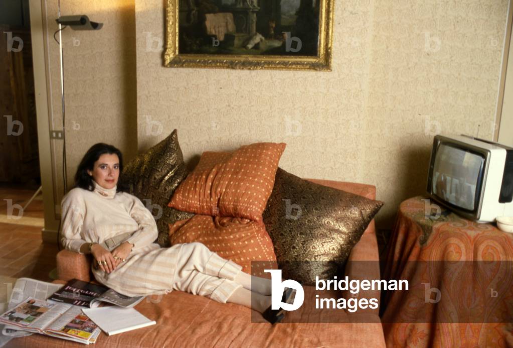 Italian fashion designer Laura Biagiotti in the rooms of her Marco Simone castle, Guidonia-Montecelio, Italy, 1984 (photo)