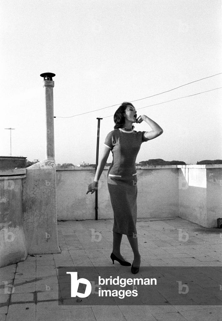 Giorgia Moll with a hand on her face