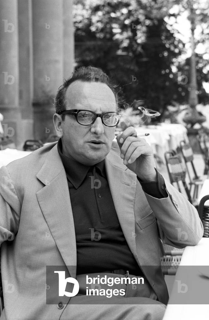 Vasco Pratolini smokes a cigarette, Florence, Italy, 1960