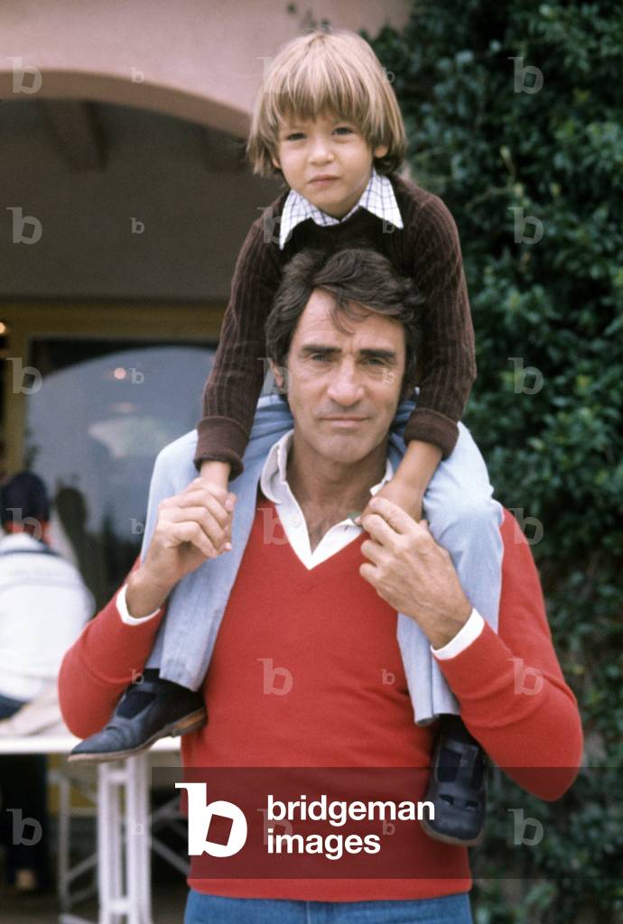 Walter Chiari, Italian actor, comician and TV host, posing with the son Simone on his shoulders, Italy, 1970 (photo)