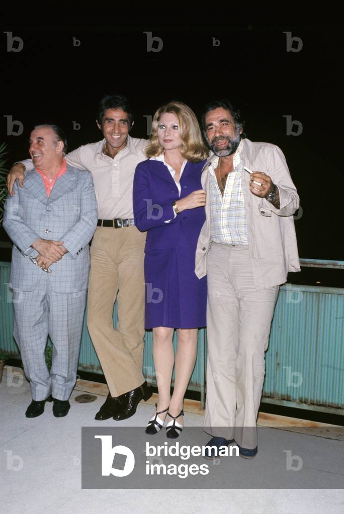 Walter Chiari, Italian actor, comician and TV host, posing with Carlo Campanini, Sylva Koscina and Alberto Lupo, Italy, 1970 (photo)