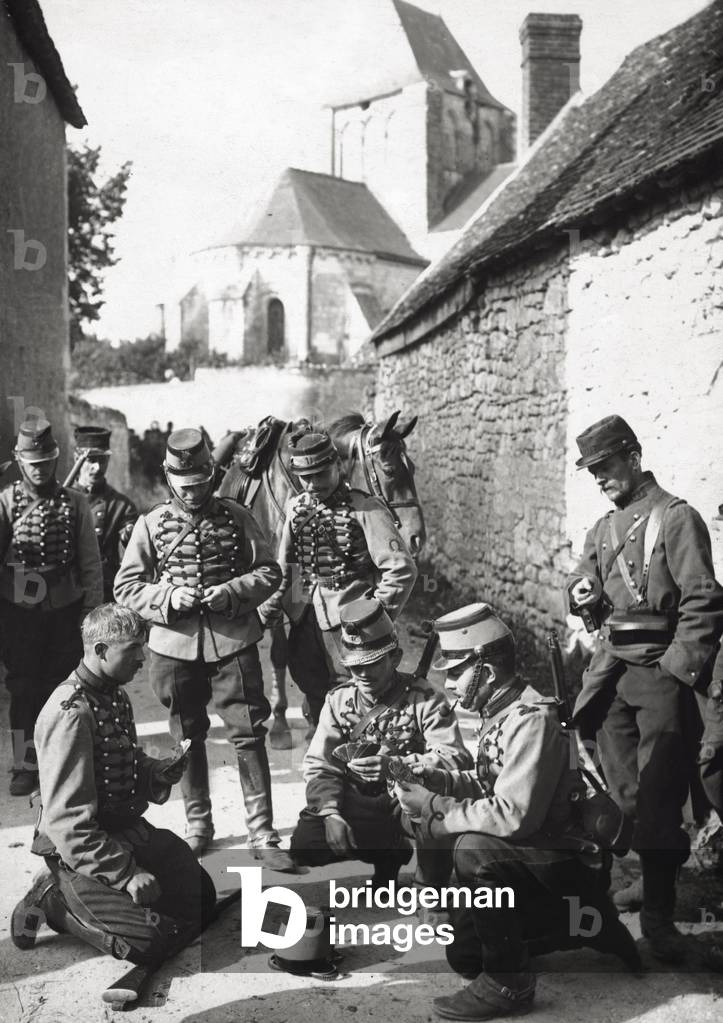Soldiers playing cards
