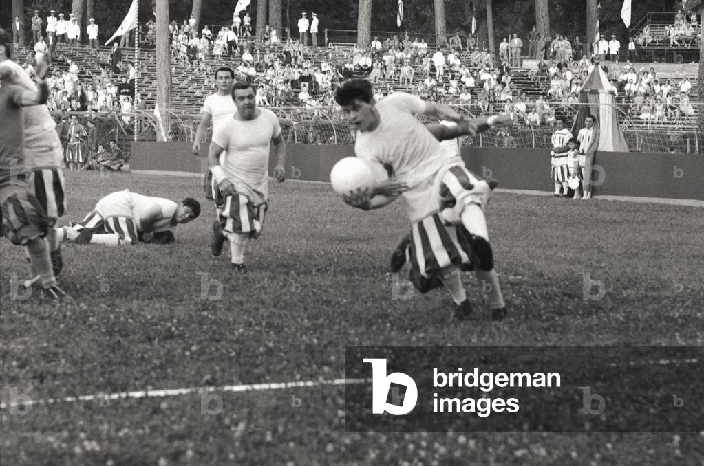A match of 'Florentine footbal' played in Rome, during the Olympies, 1960 (b/w photo)