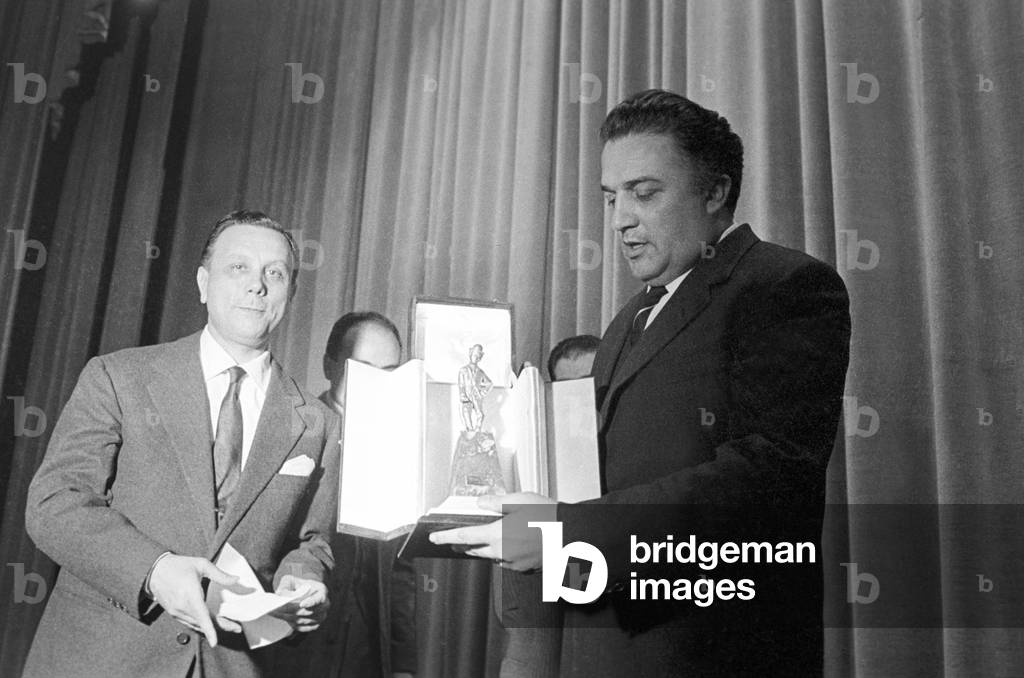 Federico Fellini receiving the Golden Chaplin, Italy, 1960 (b/w photo)