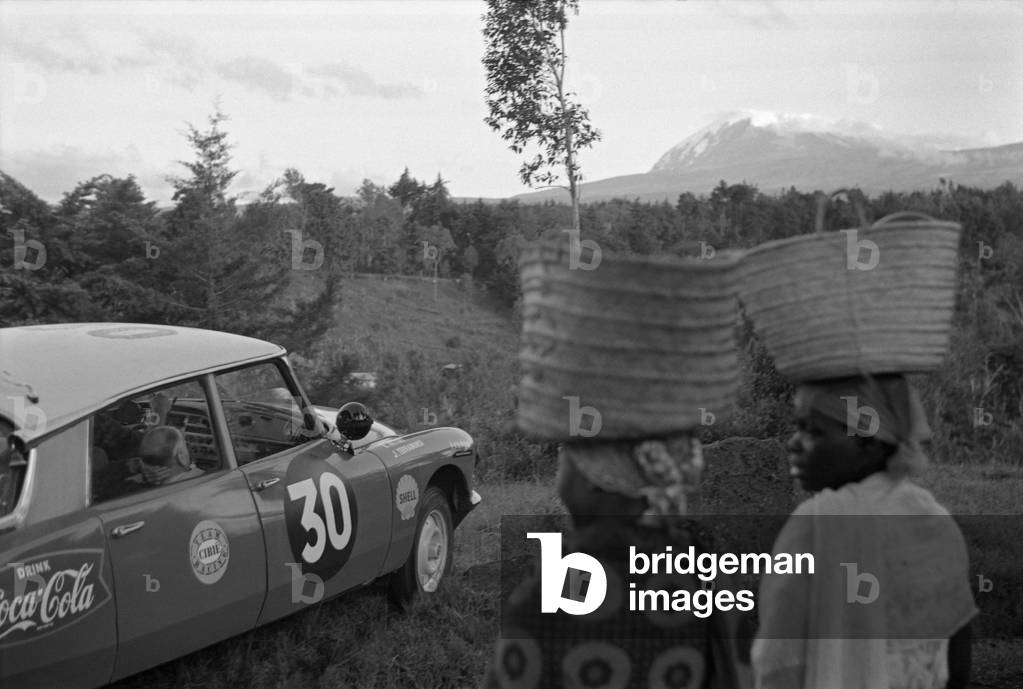 Car running the East African Safari Rally, Africa, April 1965 (b/w photo)