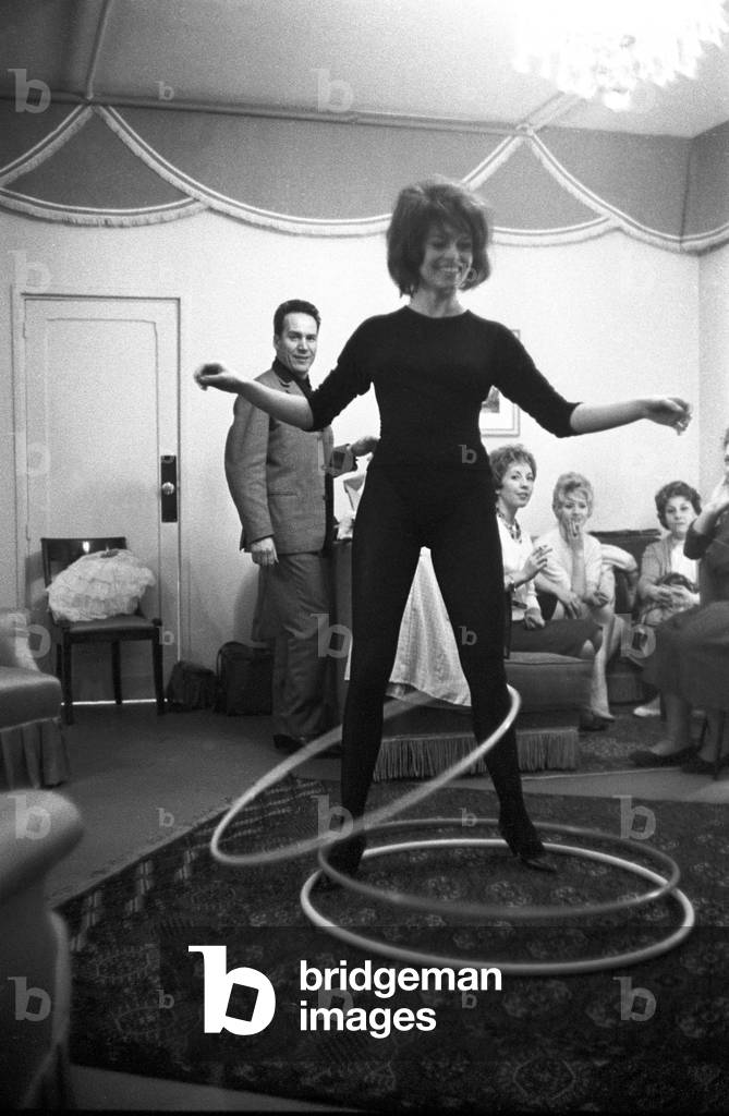 Brigitte Bardot with a hula hoop, France, 1959 (b/w photo)