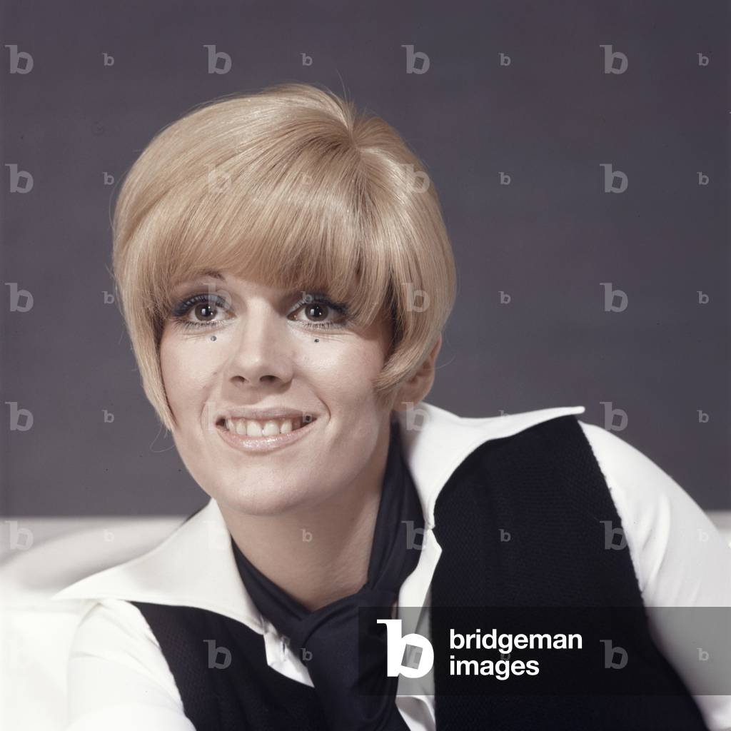 Close-up of Caterina Caselli wearing a shirt and a tie, Italy