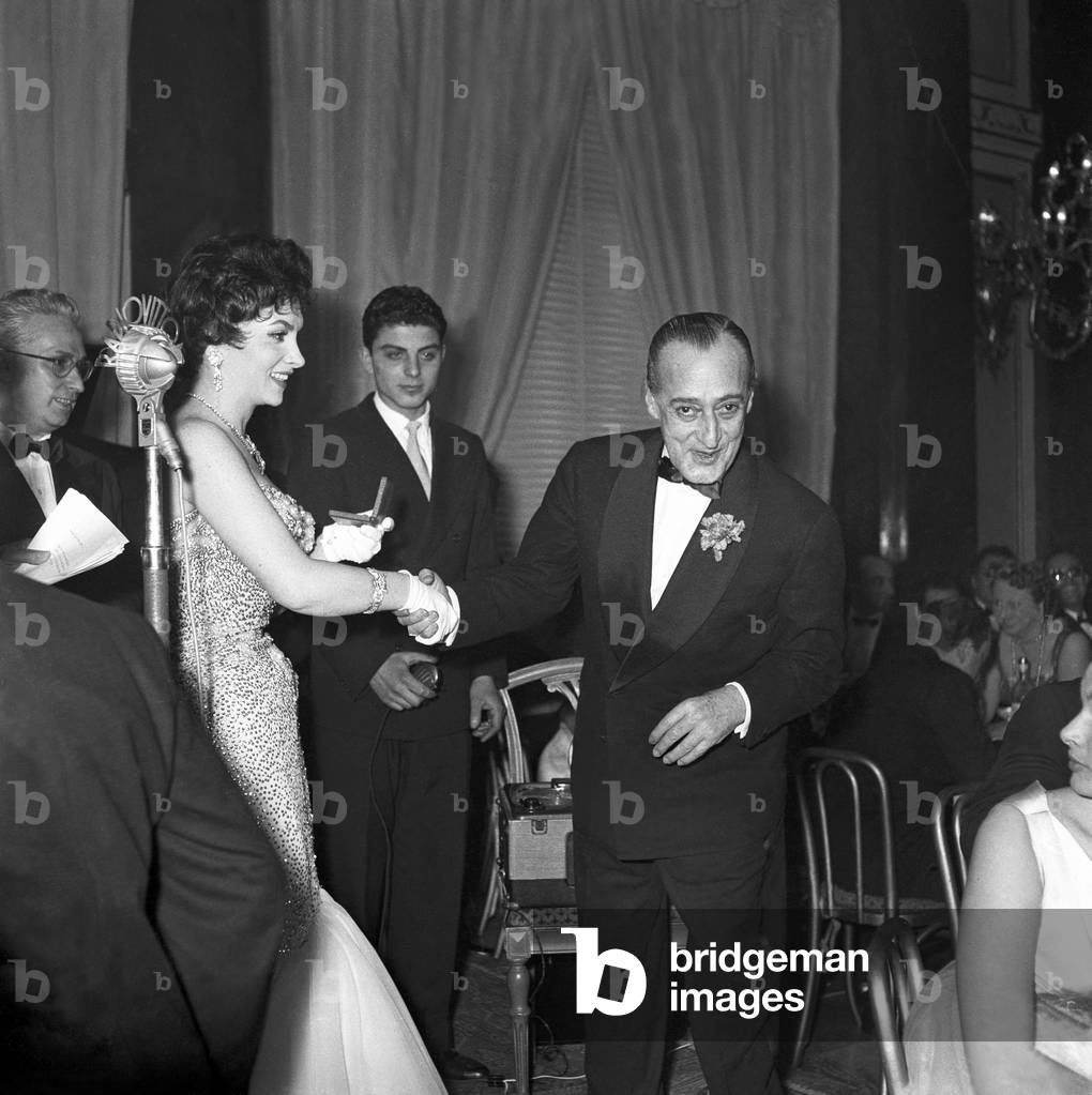 Gina Lollobrigida shaking hands with Tota², Italy, 1956 (b/w photo)