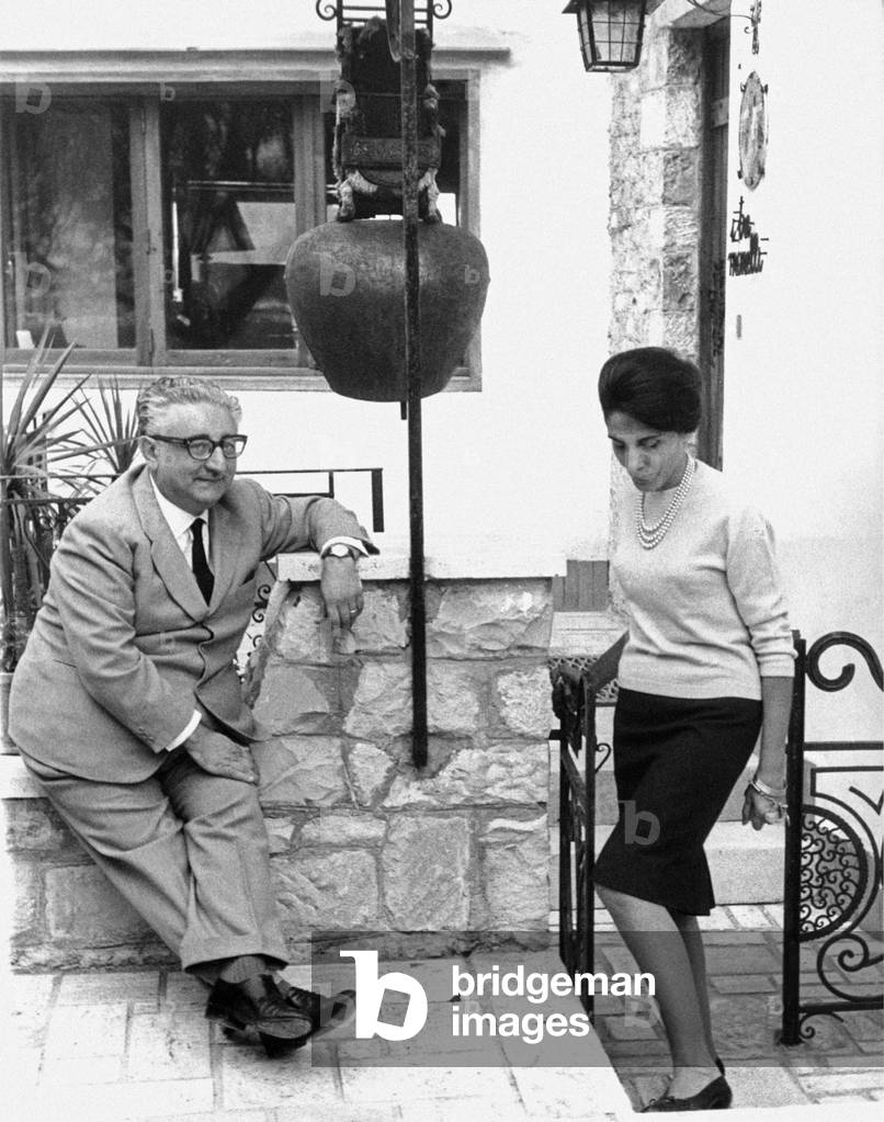Giovanni Leone in front of a cowbell with Vittoria Michitto, Roccaraso, Italy