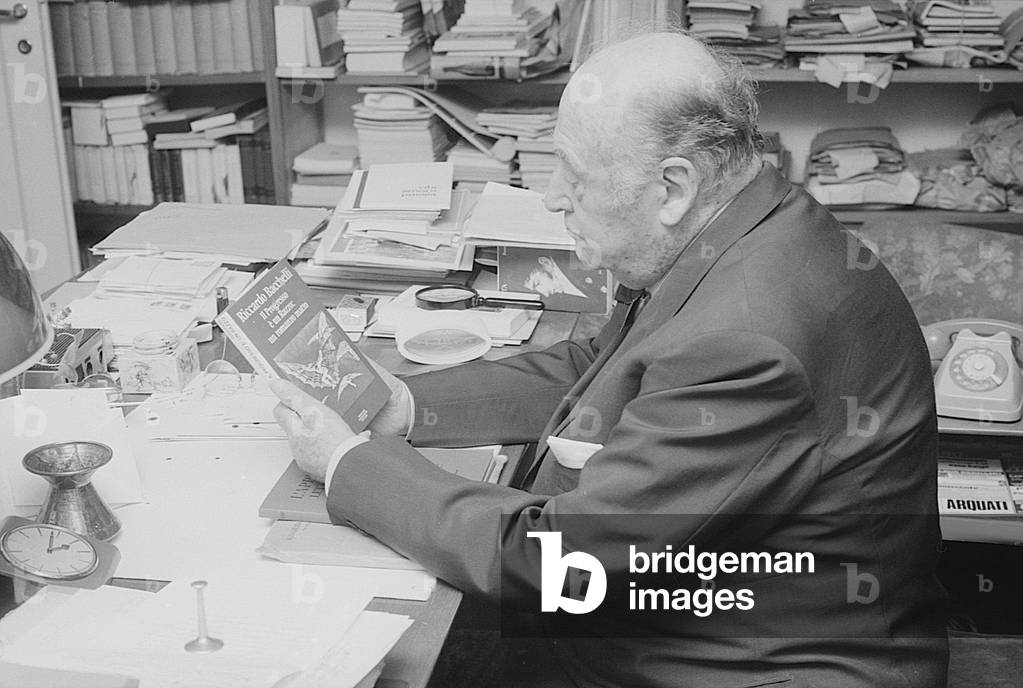 Riccardo Bacchelli posing in his house, Italy, 1975 (b/w photo)