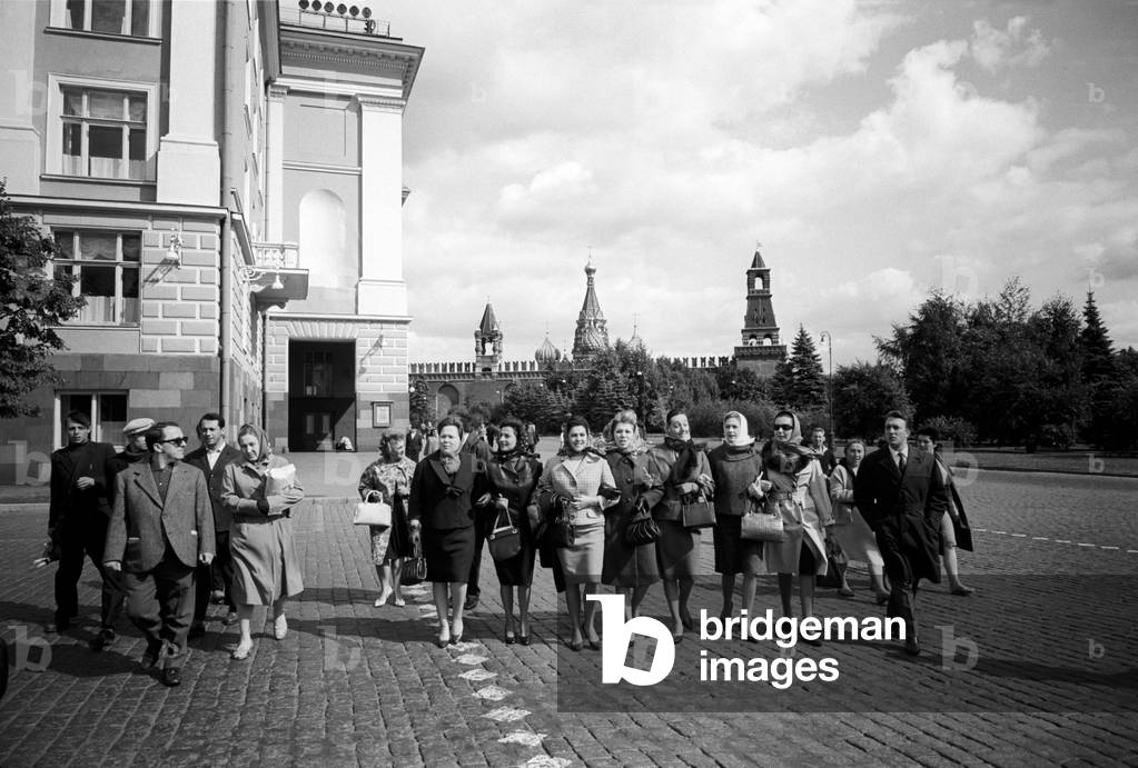 Some actresses of the Teatro alla Scala company going arm in arm for a stroll, 1964 (b/w photo)