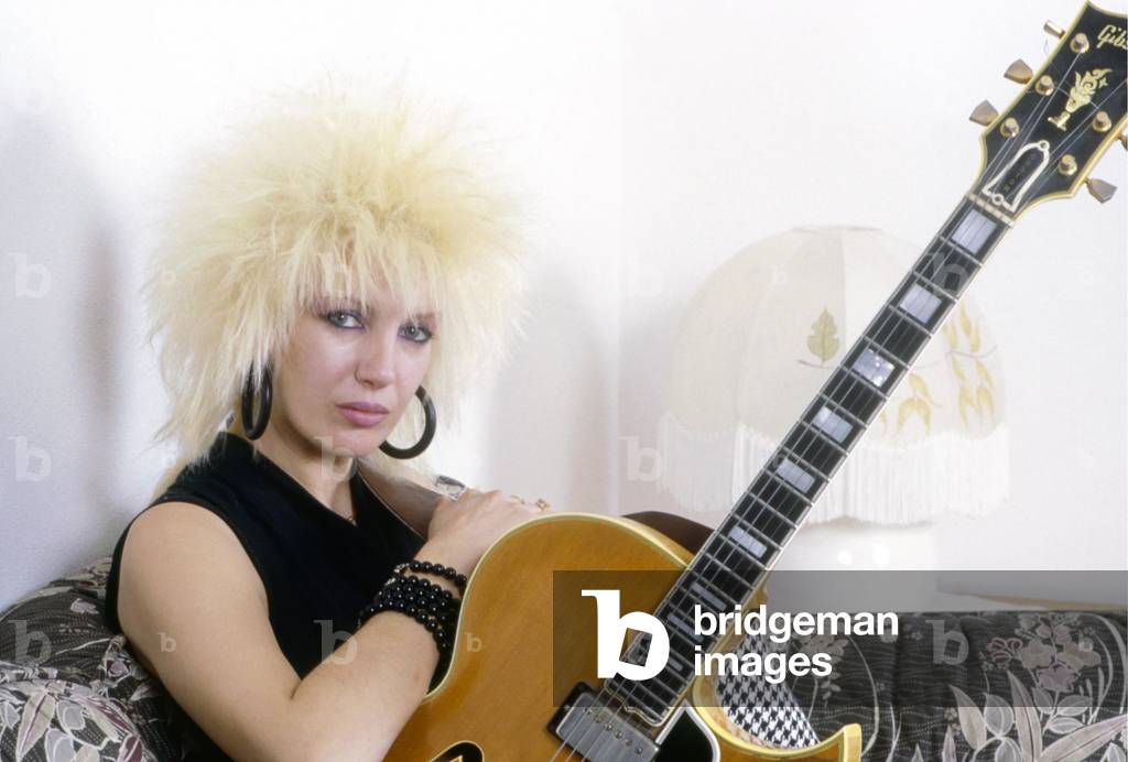 Portrait of Ivana Spagna with a guitar, Italy