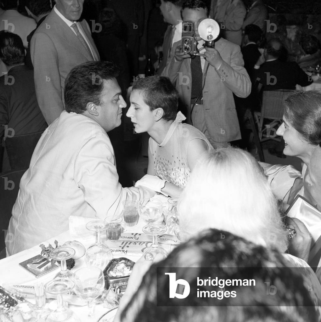 Federico Fellini and Valentina Cortese during the Silver Ribbon award ceremony, Italy, 1956 (b/w photo)