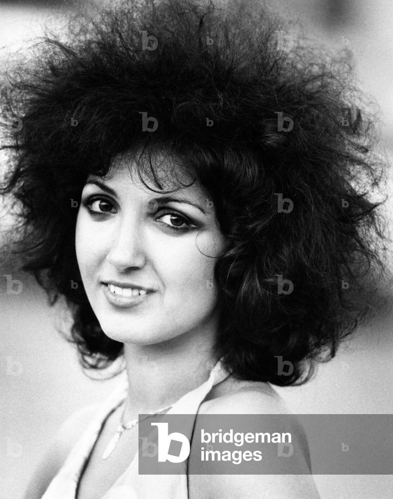 Close-up of Marcella Bella and her curly black hair