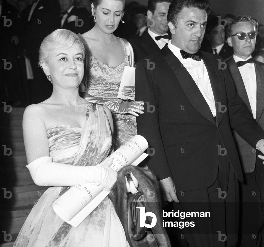 Giulietta Masina and Federico Fellini in Cannes, France, 1957 (b/w photo)