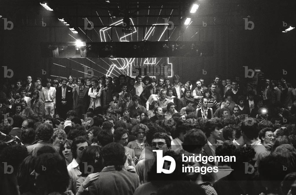 A crowd on the dance floor of a discotheque, 1979 (b/w photo)