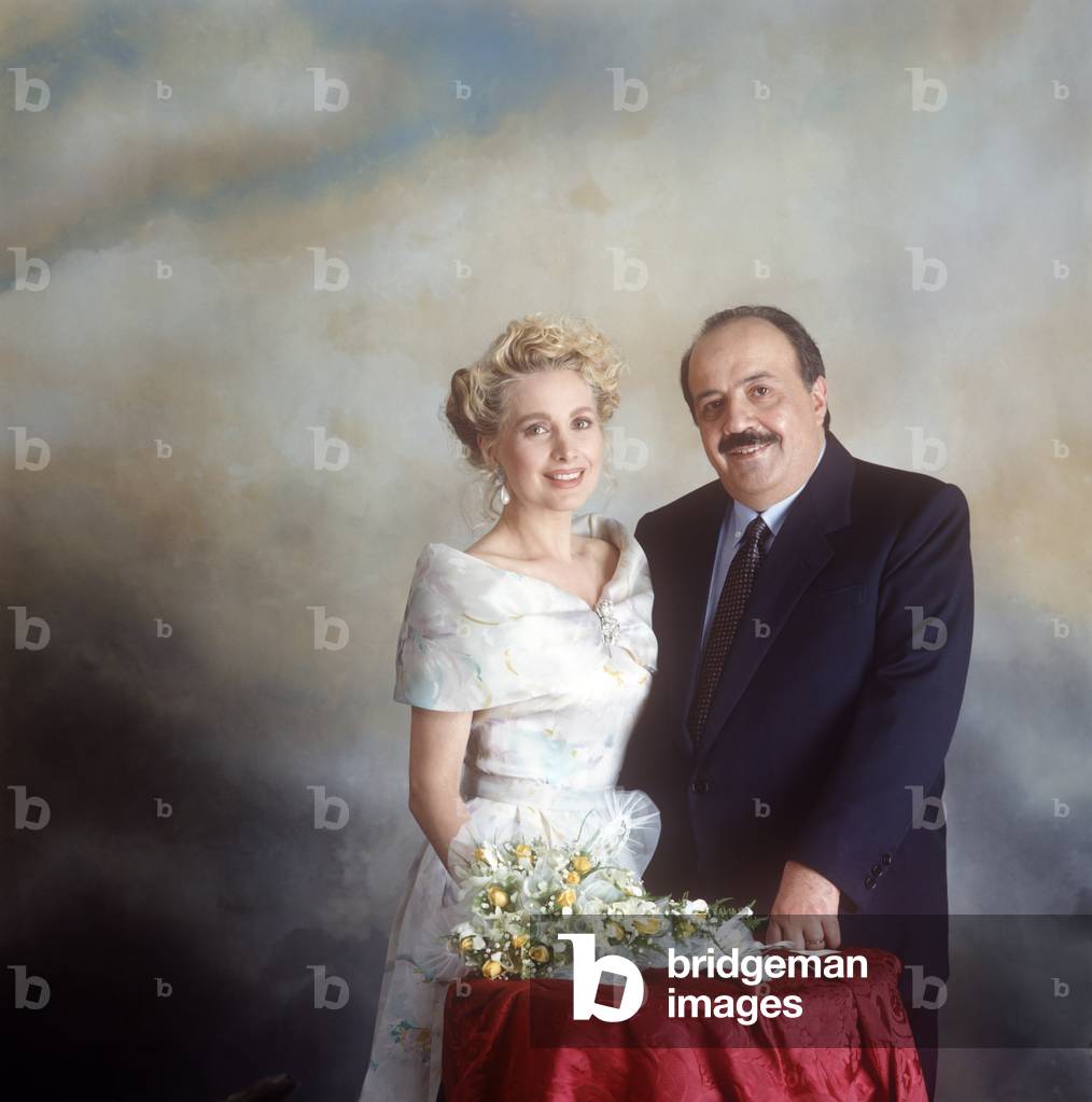 Portrait of Marta Flavi and Maurizio Costanzo smiling at their marriage