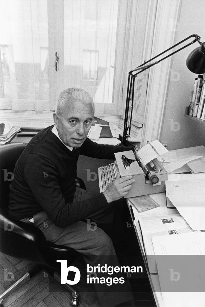 Franco Fortini using a typewriter, Italy