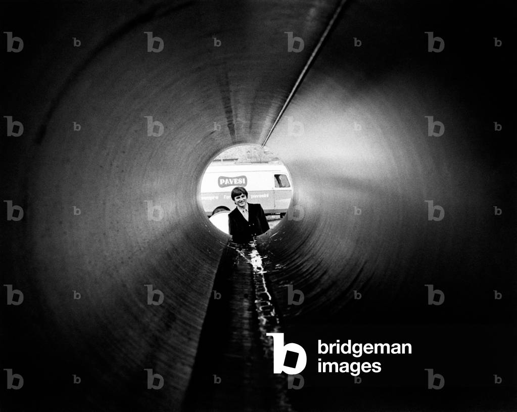 Giuliano Cederle peeping out of a big pipe