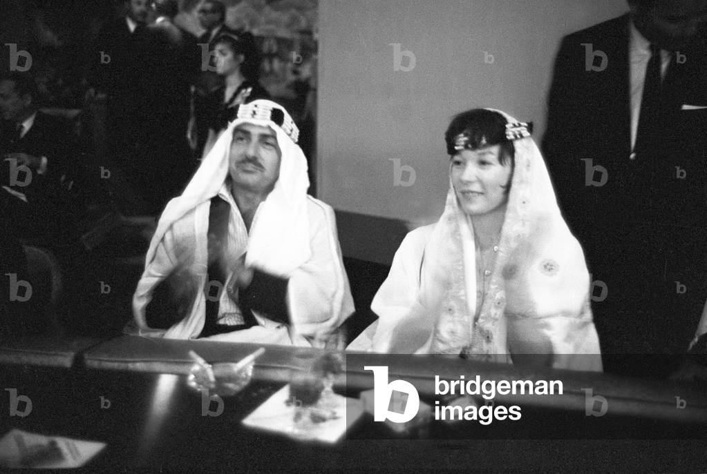 Shirley MacLaine in an Arab restaurant, USA, 1964 (b/w photo)