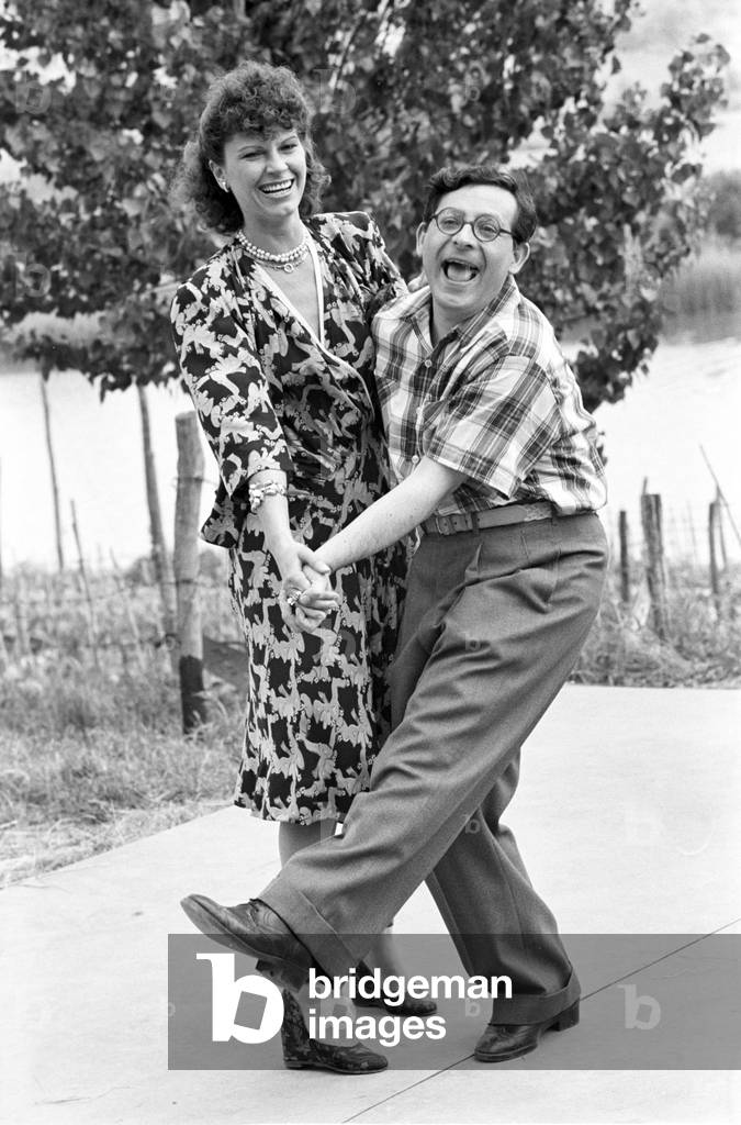 Leo Gullotta and Roberta Paladini on the set of the TV mini-series I ragazzi di celluloide (season 2), Italy, 1984 (b/w photo)