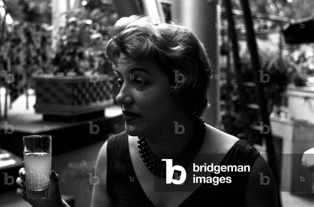 Carla Boni with a glass in her hand