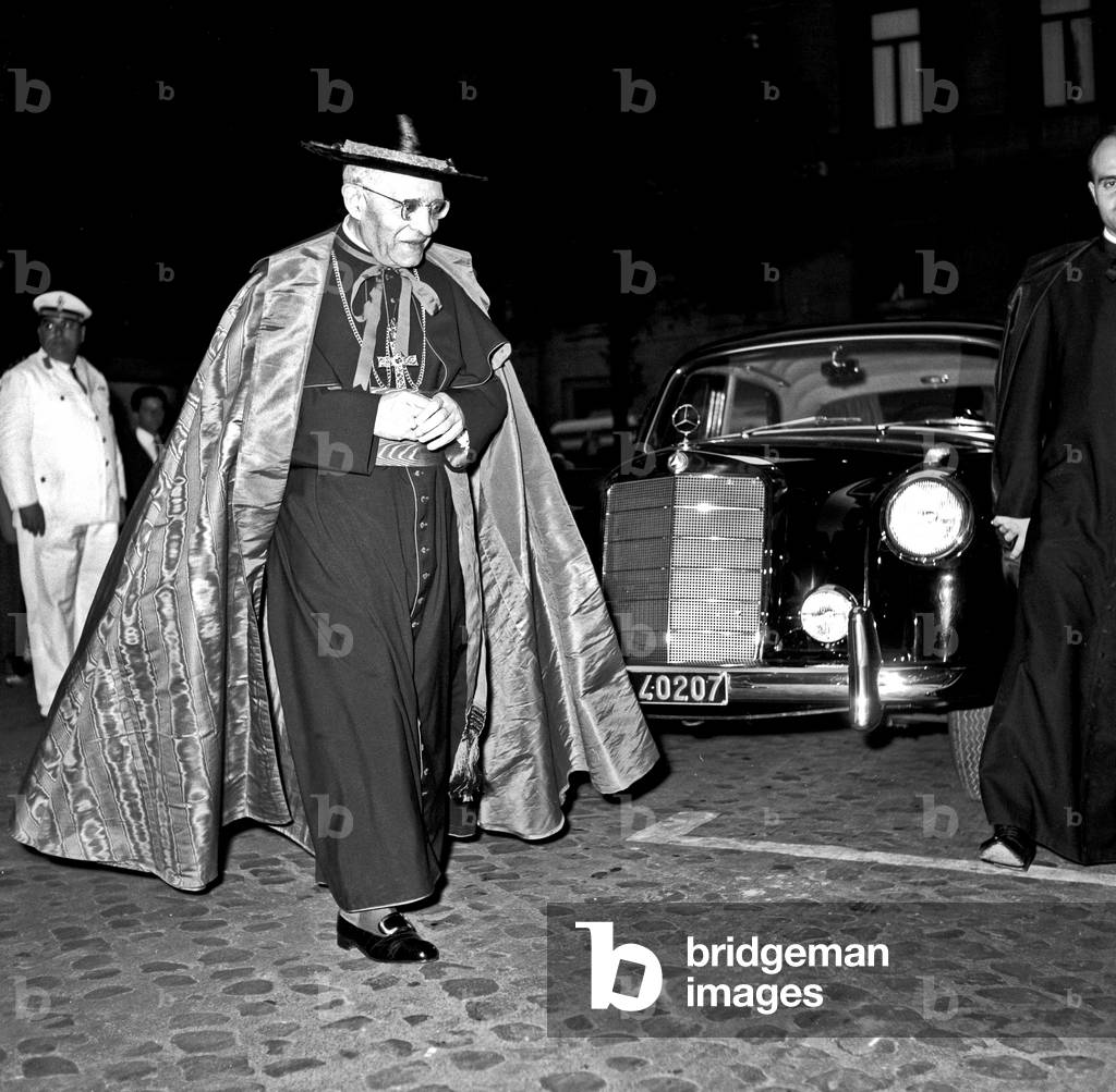 A Cardinal going towards the Grand Hotel, Rome, Italy, 1959 (b/w photo)