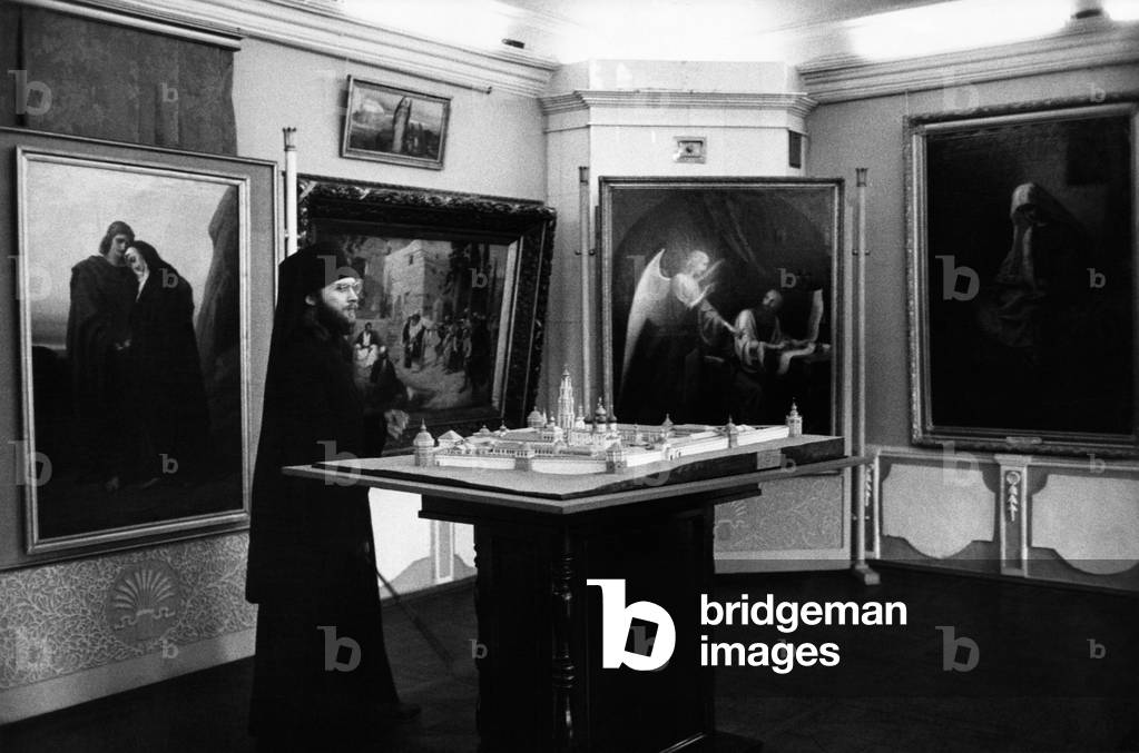 A monk in the Museum of the Monastery of Zagorsk, 1964 (b/w photo)