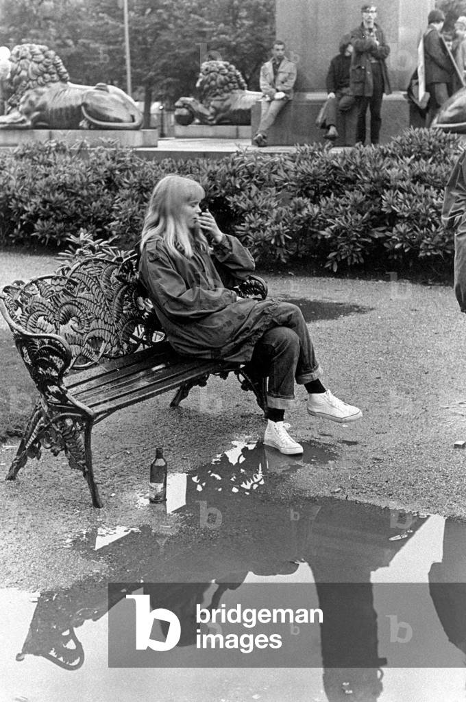 A Swedish girl sitting on a bench, Stockholm, Sweden