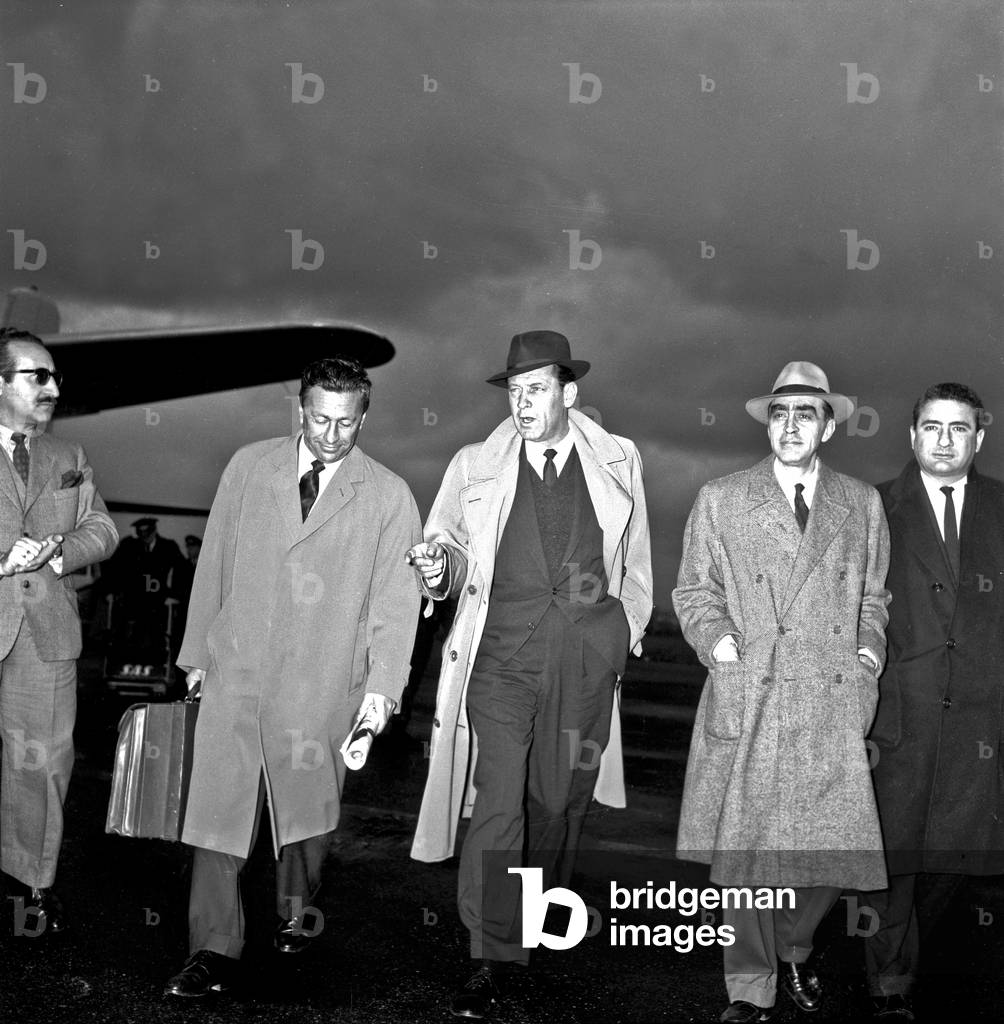 William Holden arriving at Ciampino airport, Ciampino, Italy, 1958 (b/w photo)