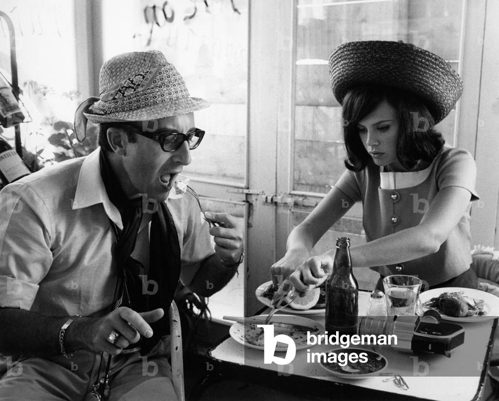 Britt Ekland having lunch with Peter Sellers, 1965 (b/w photo)