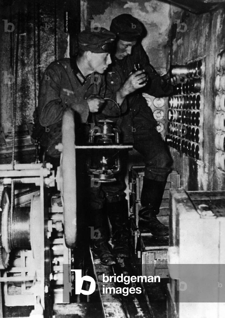 German soldiers checking a munitions depot