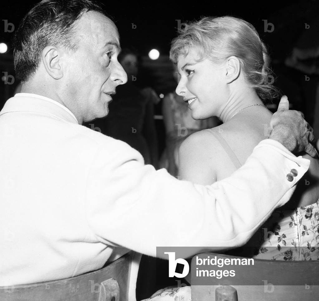 Marisa Allasio and Emilio Federico Schuberth during the beauty pageant Miss Belvedere delle Rose, Italy, 1956 (b/w photo)