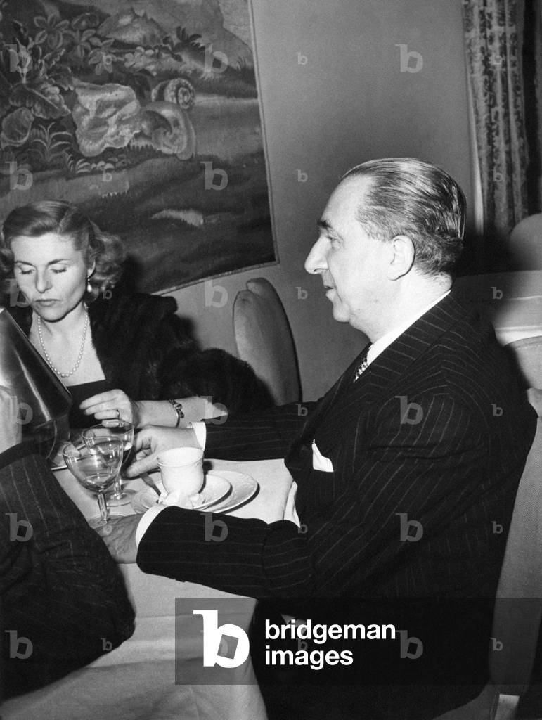 Giuseppe Pella out to dinner with friends, Rome, Italy