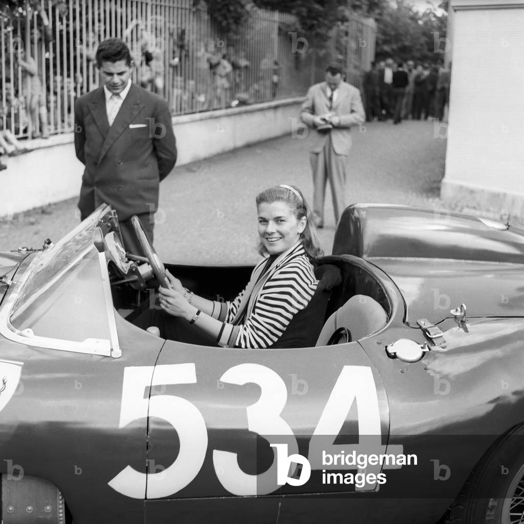 Louise Collins into Peter Collins's car, Italy