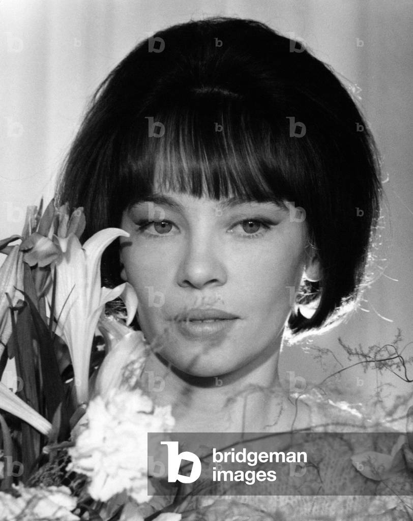 A close-up of Leslie Caron, 1965 (b/w photo)