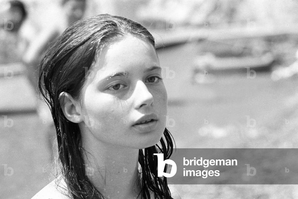Isabella Rossellini on the beach in Positano, Italy, 1966 (b/w photo)