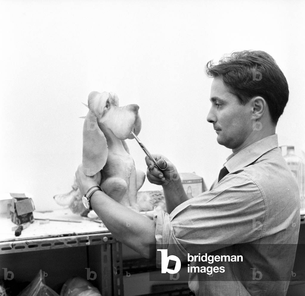 Federico Caldura fixing a puppet