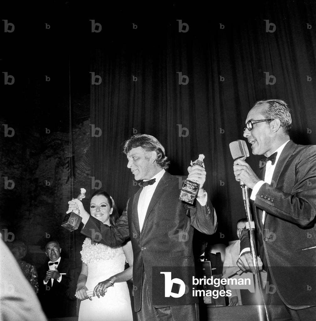 Richard Burton getting the 'David di Donatello' award, Taormina, Italy, 1967 (b/w photo)