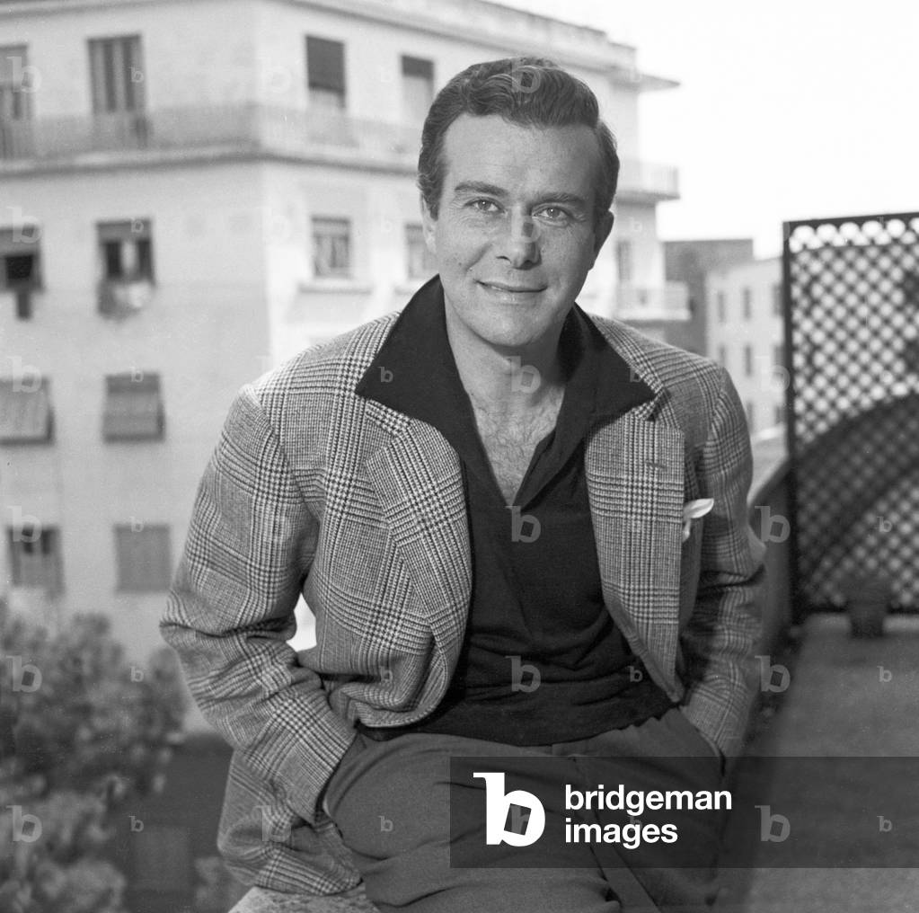 Massimo Serato on the terrace of his house, Italy, 1957 (b/w photo)