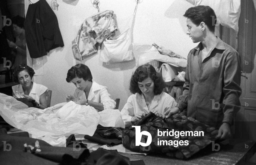 Roberto Capucci with some tailors, Rome, Italy, 1950