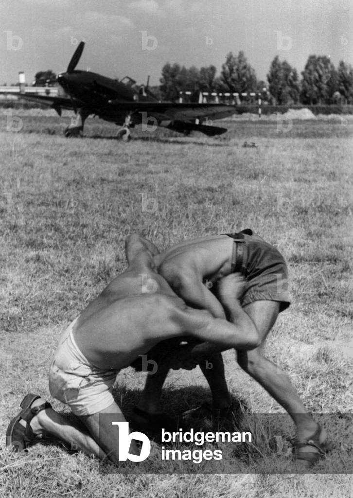 Two airmen practising sports