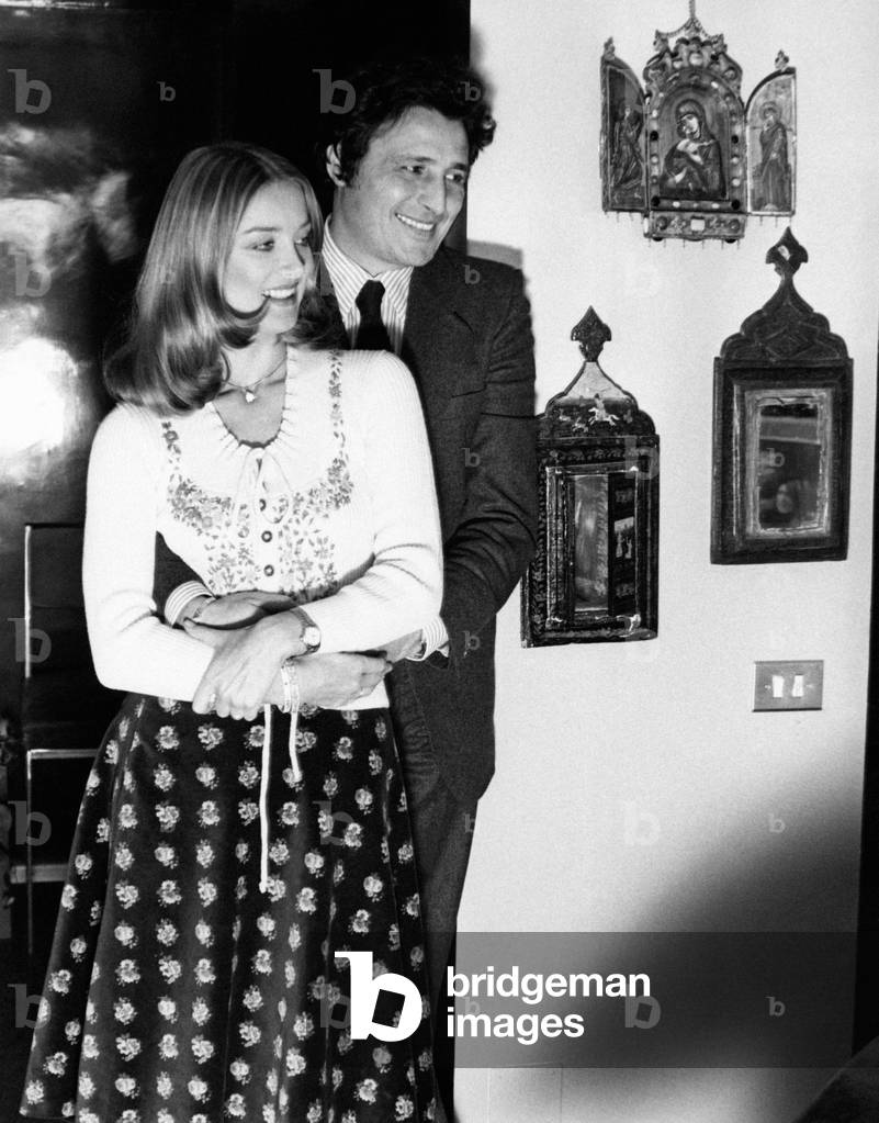 Barbara Bouchet and her husband Luigi Borghese embraced