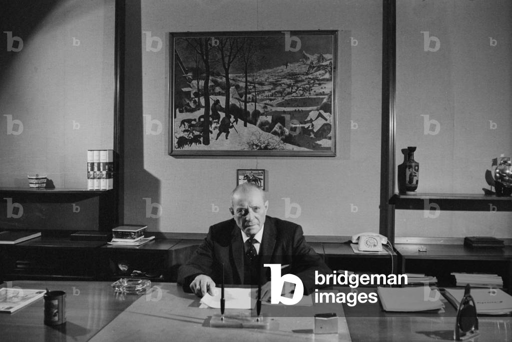 Eden Fumagalli at his desk in his office, Italy, 1966 (b/w photo)