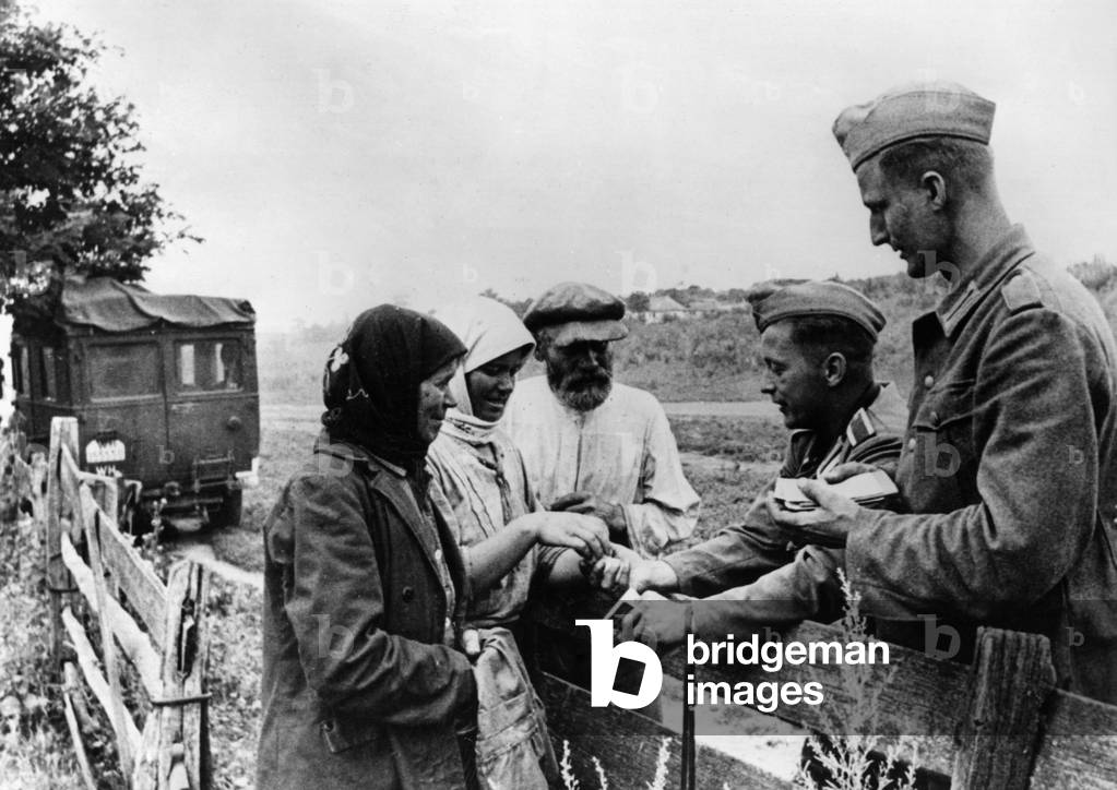 German soldiers buying food